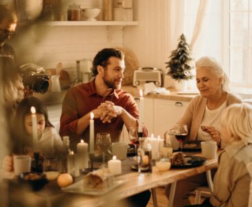 people sitting beside table